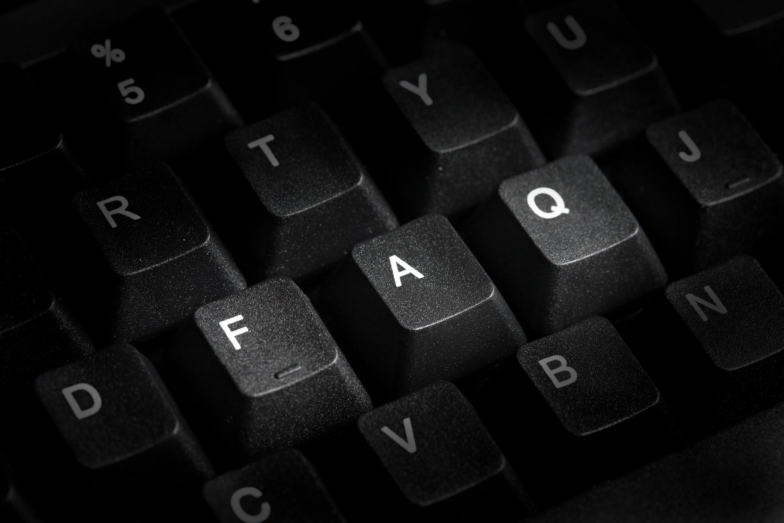 Keyboard keys with FAQ letters
