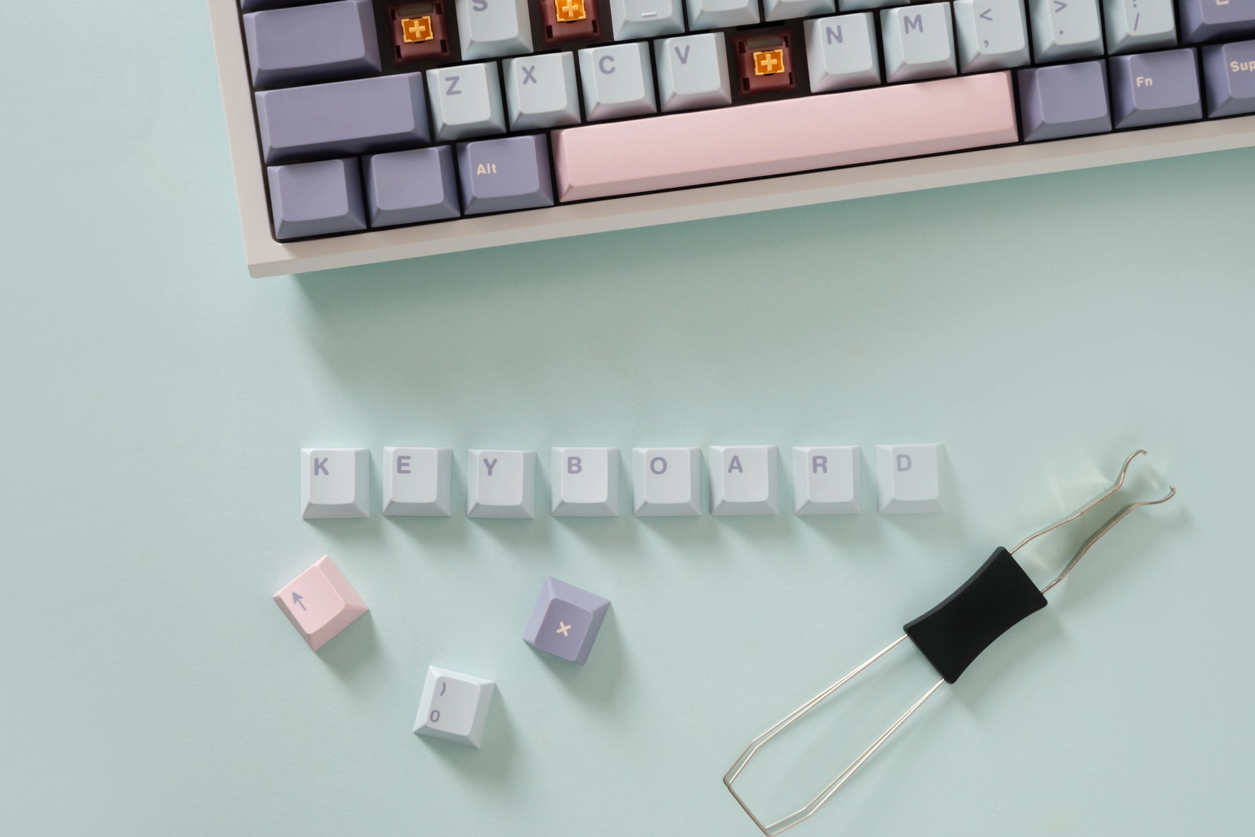 Mechanical keyboard keycaps on blue background